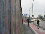 25243 Brad walking by Berlin wall.jpg